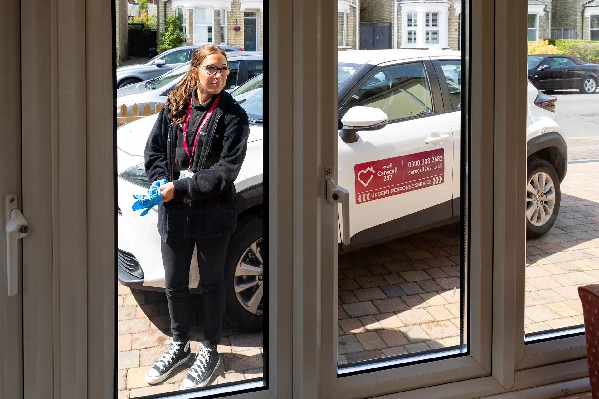 A Provide Carecall247 responder arriving to help at someone's home.