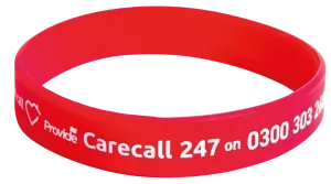 Red Provide Carecall247 emergency wristband printed with the 24/7 phone number